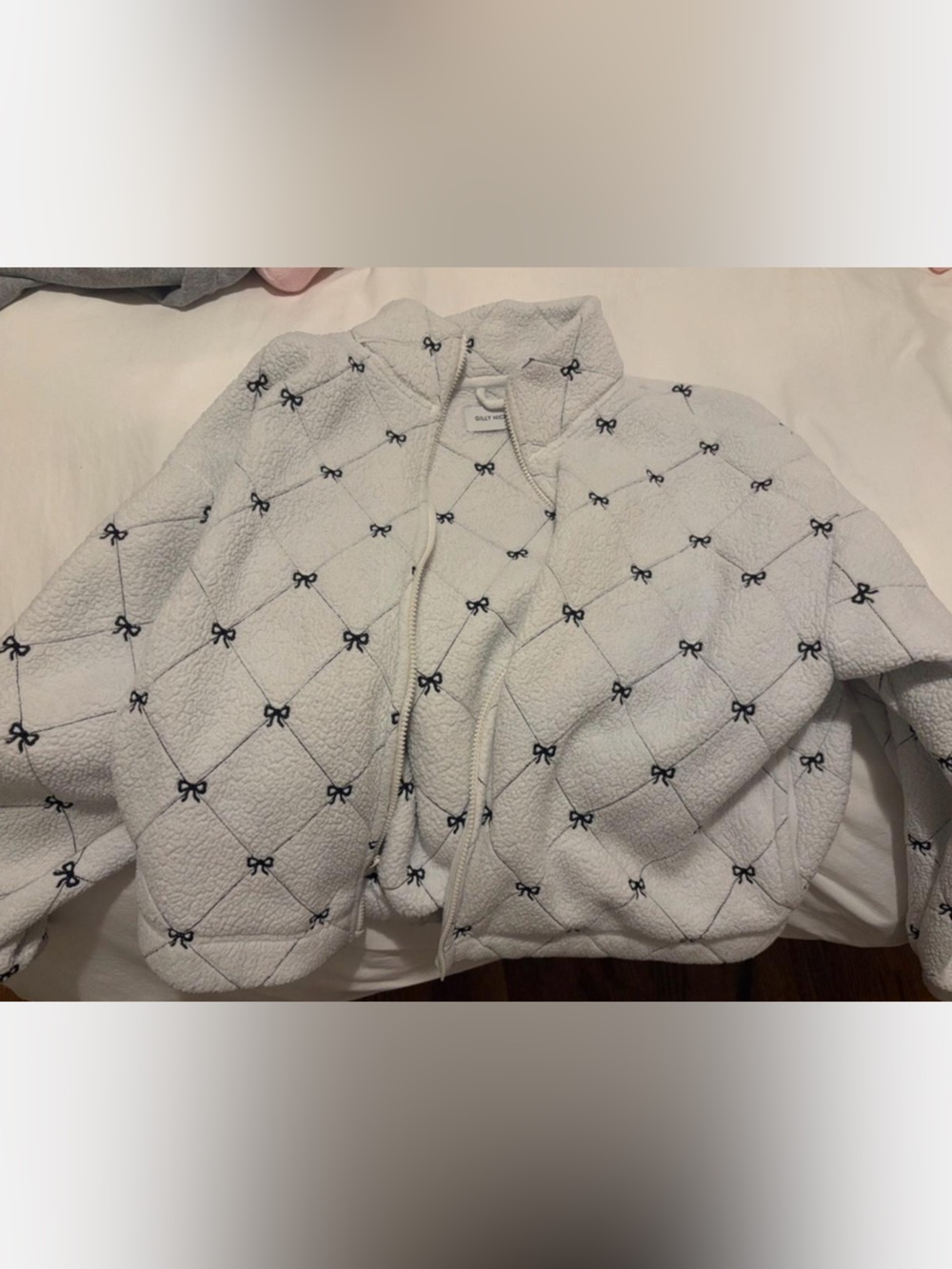 Hollister Cozy White Sherpa Jacket with Black Bow Stitching